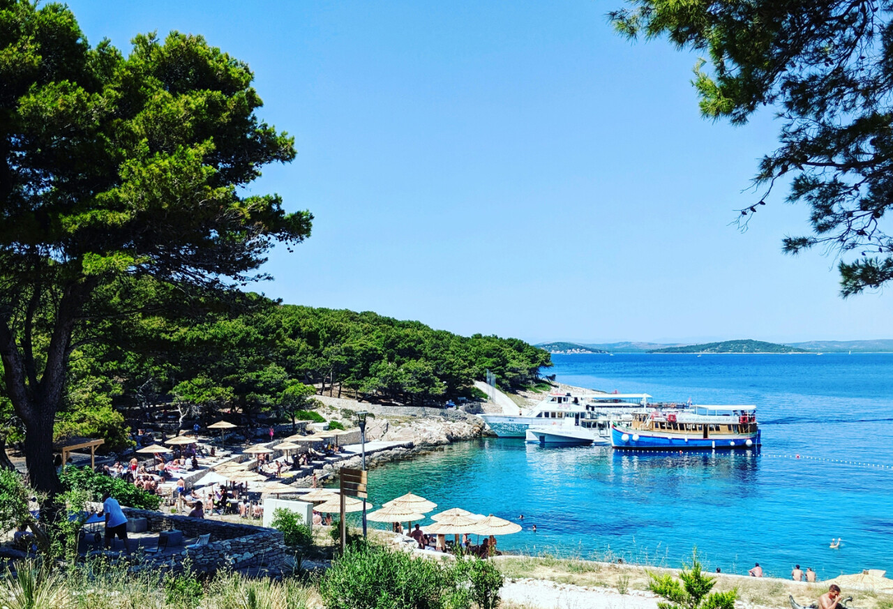 Zlarin charms sailors with its car-free streets, serene anchorages, and authentic Dalmatian atmosphere.